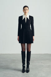 Tailored wool mini dress with oversized contrast collar and pleated skirt for chic formal flair